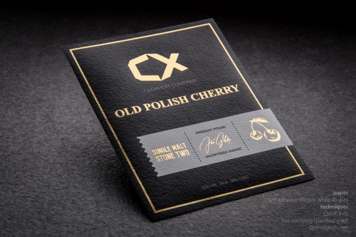 Czarna naklejka-etykieta samoprzylepny papier Martele złoty hot-stamping pełny kolor CMYK