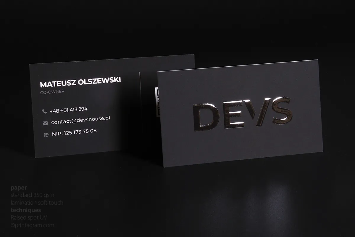 Black business cards with UV selective varnish
